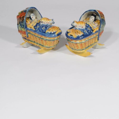 Delft Ceramic Polychromes Figures Of Baby In Cradle