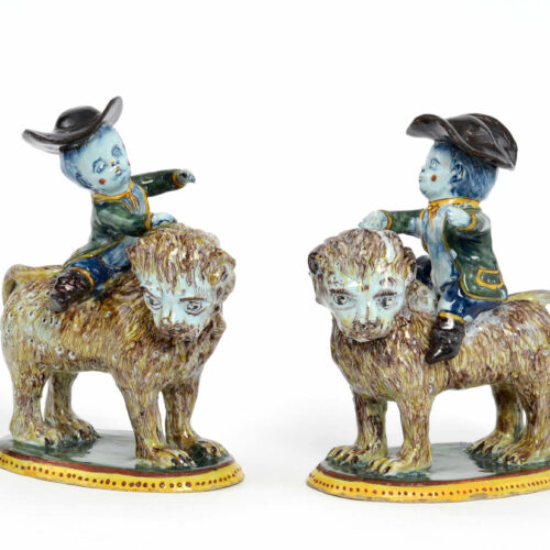 Antique Polychrome Figurine Of Boys Riding Lions At Aronson Antiquairs